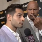 The rock flipping off interviewer