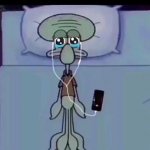 Squidward crying in bed