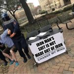 iRoN MAn | marvel Marvel IRON MAN'S SUIT IS NOT MADE OUT OF IRON | image tagged in change my mind guy arrested,iron man,marvel,funny,memes | made w/ Imgflip meme maker