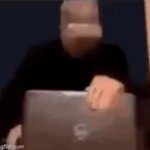 Man looking at laptop