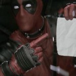 Deadpool pointing at paper