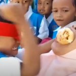 kid hammers bread into her mom' mouth