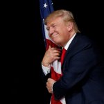 Trump holding the American Flag