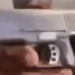 black guy loading a gun GIF Template
