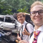 Missionaries with Destroyed Cars
