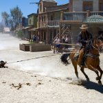 cowboy dragged by horse