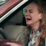 Crying woman in the car