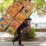 Carrying a heavy load on your back