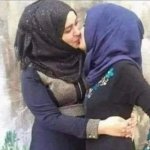 Muslim women kissing