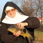 carp catching nun