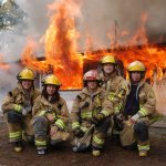 posing firefighters