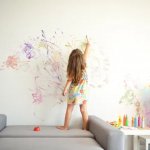 Child drawing on Wall