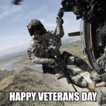 US Army Medic hanging out of UH-60 Helicopter over Afhaganistan | HAPPY VETERANS DAY | image tagged in us army medic hanging out of uh-60 helicopter over afhaganistan,happy veterans day | made w/ Imgflip meme maker