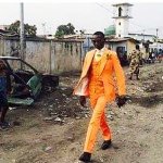 orange suit pimp strut africa me