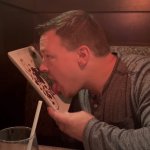 Guy licking plate