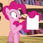 pinkie holds paper