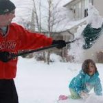 Dumping snow on kid