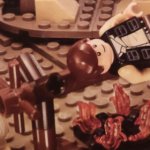 LEGO Han Solo happily being cooked by Ewok