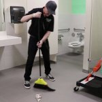 Janitor cleaning bathroom
