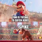 The damn mouse always has someone to help him | TOM IS TRYING TO CATCH JERRY; SPIKE | image tagged in donkey kong grabbing mario,tom and jerry,warner bros,cartoons,cartoon network | made w/ Imgflip meme maker