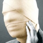 Head wrapped in bandages meme