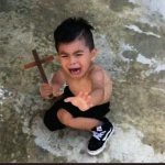 Scared kid with cross