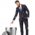 Man pointing at trashcan