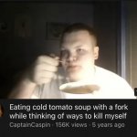 Eating cold tomato soup with a fork