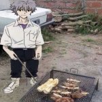 He is grilling