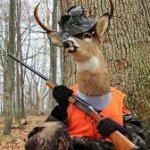 deer holding a gun