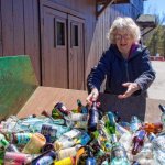 Woman recycling