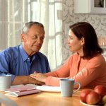 Couple at kitchen table