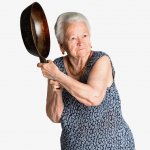 Angry old lady with pan