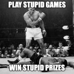 Muhammad Ali | PLAY STUPID GAMES; WIN STUPID PRIZES | image tagged in muhammad ali | made w/ Imgflip meme maker