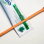 chopsticks on toothpaste tube meme