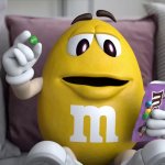 Yellow M&M with M&M's Bag