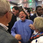 Ron DeSantis laughs