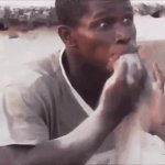 Black guy eating Sand GIF Template
