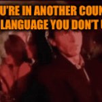 Just because I’m in the country doesn’t mean I know the language | WHEN YOU’RE IN ANOTHER COUNTRY AND THE ADS DO A LANGUAGE YOU DON’T UNDERSTAND: | image tagged in gifs,funny,patrick bateman,language | made w/ Imgflip video-to-gif maker