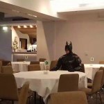 Batman at table