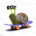 badass stock photo of a snail on a skateboard with sunglasses