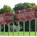 ROW OF STOP SIGNS STOP STOP STOP