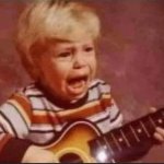 screaming kid playing guitar