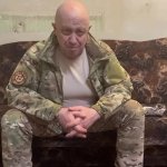 Prigozin sitting on sofa