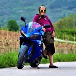 Old woman and fast motor bike