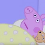 Peppa laying in bed