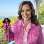 MI Gov Whitmer with a Barbie doll