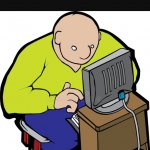 Bald guy on computer