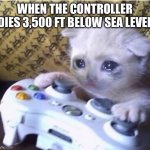 Whomp whomp | WHEN THE CONTROLLER DIES 3,500 FT BELOW SEA LEVEL | image tagged in sad gaming cat | made w/ Imgflip meme maker