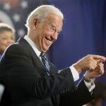 Biden laughing and pointing